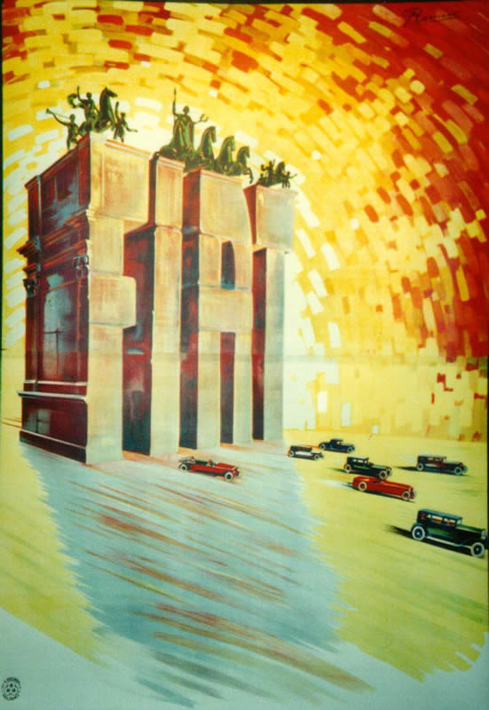 Cars drive through triumphal arch composed of letters; yellow, orange, red